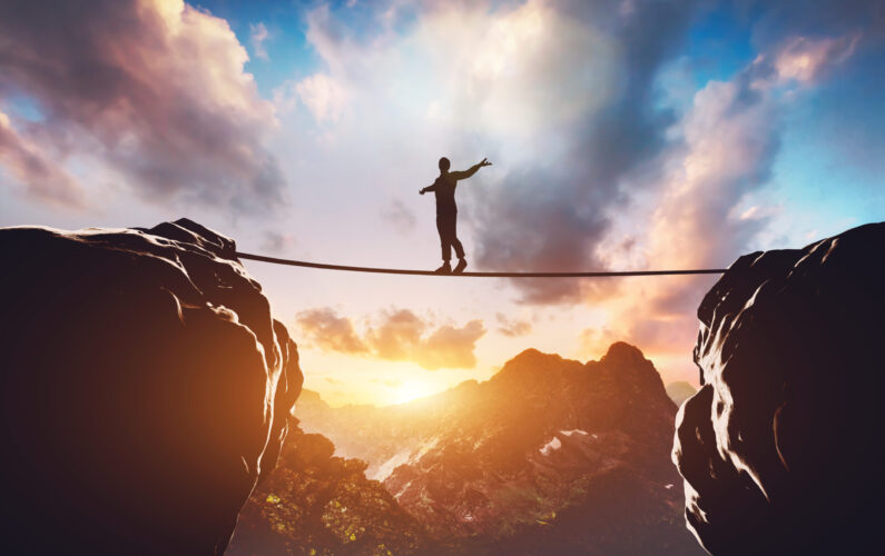 Man walking on rope between two high mountains at sunset. Concept of taking a risk, adventure, motivation. 3d illustration